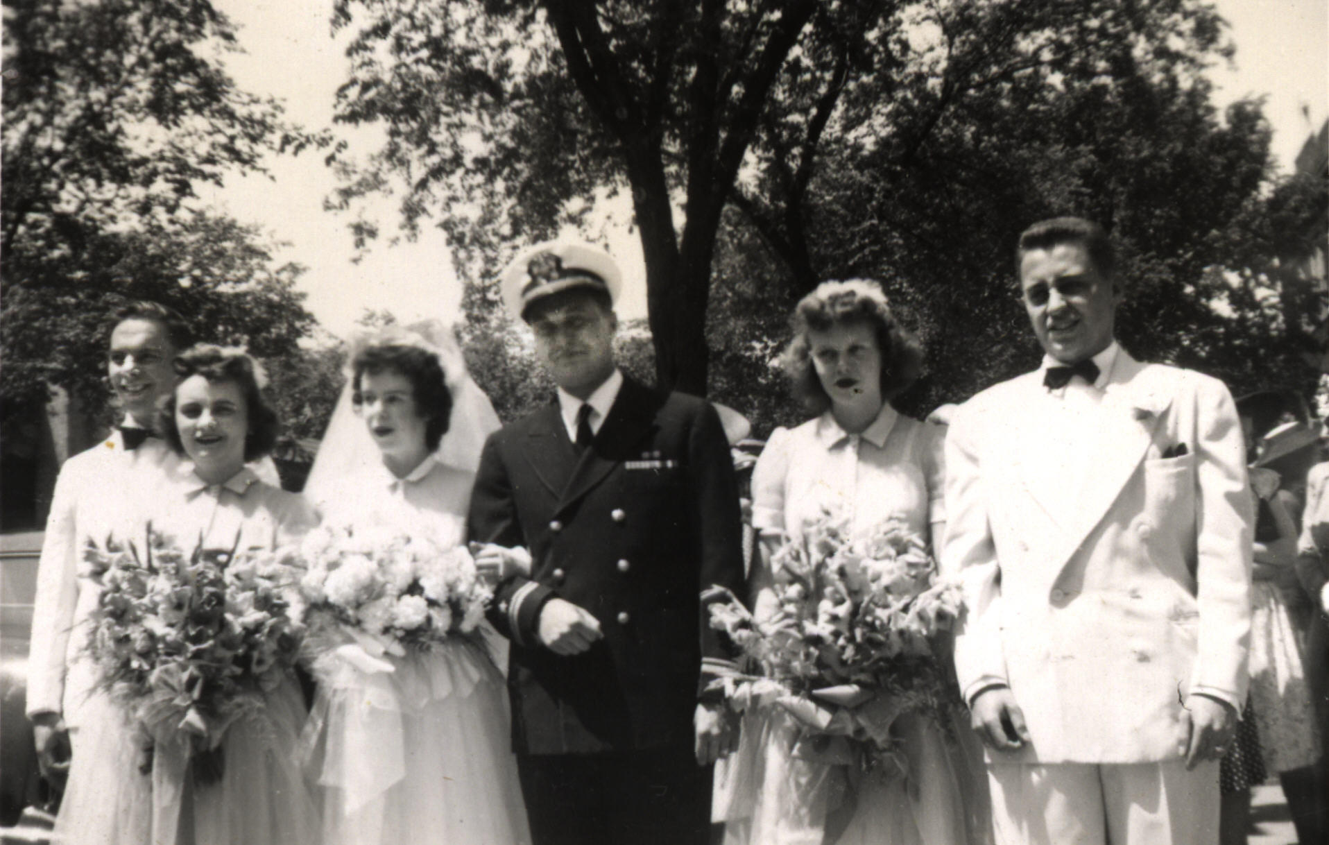 U.S. Navy Lieutenant J.G. Robert James Bach (my father) who served from 1944-1946 pictured center at his wedding.